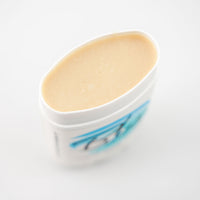 Blu Naturals Patchouli Orange Lavender Deodorant, natural aluminum-free deodorant with essential oils, featuring fresh orange slices and lavender flowers, eco-friendly skincare product