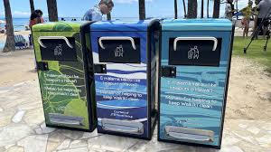 Trash cans on a beachfront in Hawaiʻi.